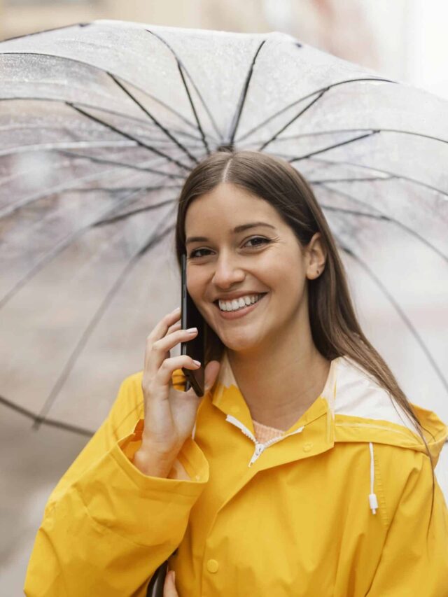 woman-with-umbrella-using-mobile-phone (1)